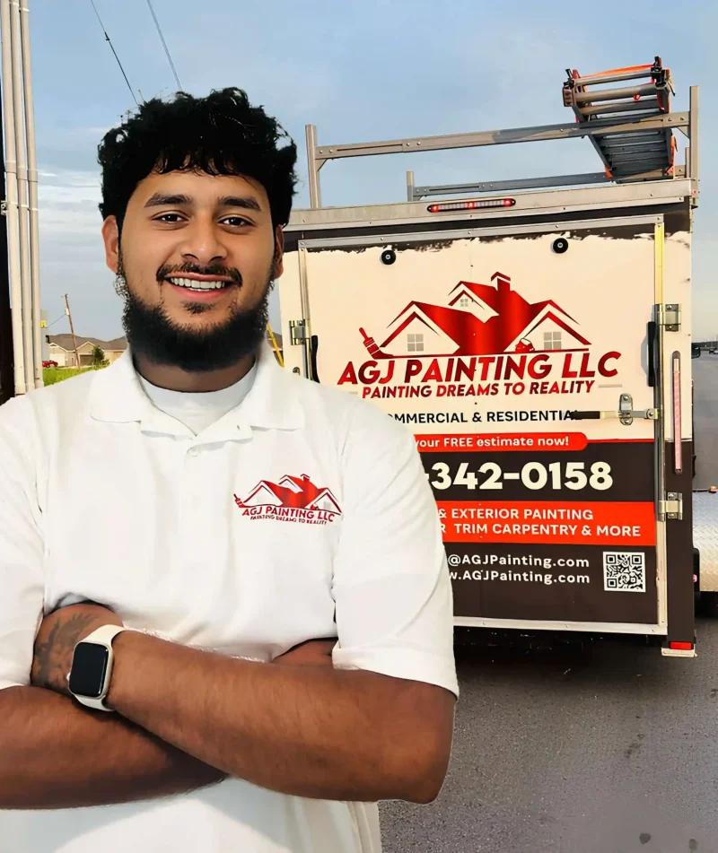 Local painting company owner in Austin TX Owner of Austin TX painting company standing in front of branded business car