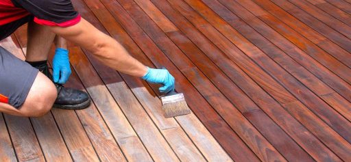 staining-wooden-deck-619139456